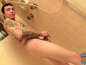 Thug With Tattoos Stroking His Big Dick In Bathroom